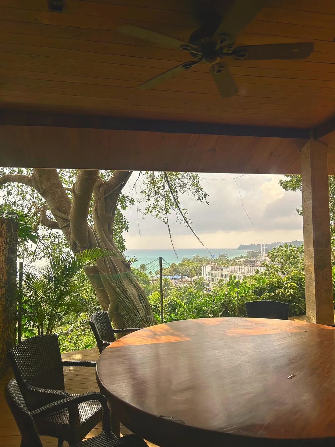 Covered dining terrace overlooking the coastline